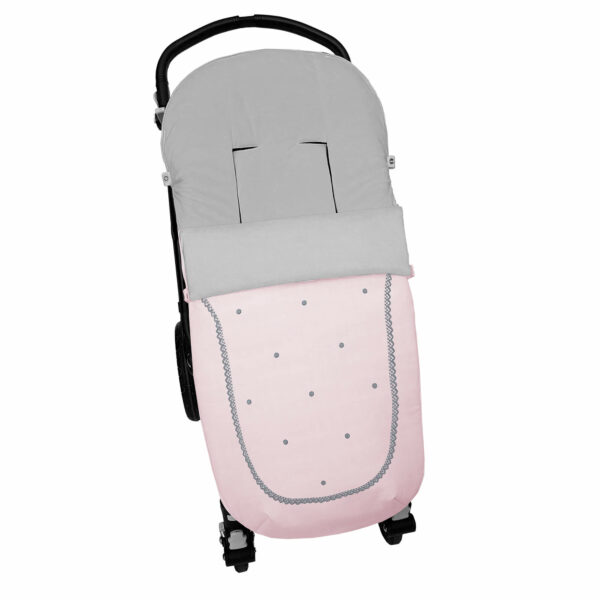 Saco para silla modelo universal en tejido polipiel rosa con picos y bodoques gris. Interior en pelo gris