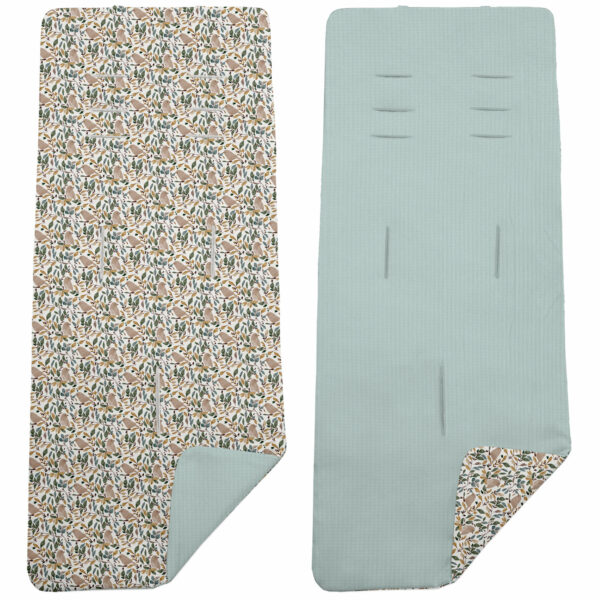Colchoneta para silla reversible por un lado en serker de algodón color menta y por el otro lado batista estampada diseño Dylan